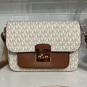 Brand new,was gifted to me but to small for my style